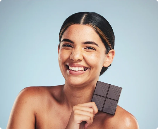 Woman smiling, holding chocolate, sk_life_2